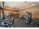 Well-equipped gym with a variety of cardio machines, weightlifting equipment, and mirrors for a complete workout experience at 13456 Via Varra # 208, Broomfield, CO 80020