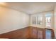 Bright living room featuring windows and a glass door leading to the outdoor space at 13456 Via Varra # 208, Broomfield, CO 80020