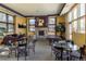 Spacious lounge area featuring comfortable seating, a fireplace, and a pool table for recreation and relaxation at 13456 Via Varra # 208, Broomfield, CO 80020