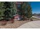 Sign for Vantage Pointe apartments surrounded by shrubs and gravel at 13456 Via Varra # 208, Broomfield, CO 80020