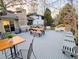 Backyard deck featuring a seating area and a play structure, perfect for Gathering gatherings and entertainment at 3326 S Geneva St, Denver, CO 80231