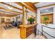 Inviting living room with exposed wood beams and bar area at 150 Hess Ave, Golden, CO 80401