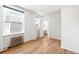 Bright bedroom with lots of natural light and classic radiator at 215 E 11Th Ave # D5, Denver, CO 80203