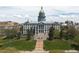 Aerial view of the Colorado State Capitol Building in Denver showcasing its impressive architecture and surrounding grounds at 215 E 11Th Ave # D5, Denver, CO 80203