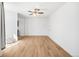 This large living room features gorgeous wood floors and a ceiling fan at 215 E 11Th Ave # D5, Denver, CO 80203