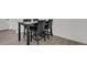 Cozy dining area with a granite-topped table and seating, offering a functional space for meals at 20999 E Quincy Dr, Aurora, CO 80015