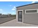 View of a patio featuring a glass door and a window at 20999 E Quincy Dr, Aurora, CO 80015