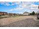 Backyard shot showing the landscape, neighborhood, and fencing at 23440 E Rockinghorse Pkwy, Aurora, CO 80016