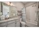 Charming bathroom with granite counters, a tub and shower combination, and modern fixtures, creating a spa-like retreat at 23440 E Rockinghorse Pkwy, Aurora, CO 80016