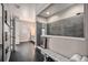 Sleek bathroom with a glass-enclosed shower and a stylish vanity, offering a serene space at 23440 E Rockinghorse Pkwy, Aurora, CO 80016