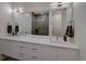 Modern bathroom boasts double sinks, sleek vanity, and a large mirror at 5125 W 29Th Ave # 1, Denver, CO 80212