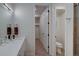 Bright bathroom with walk-in closet and adjacent toilet room at 5125 W 29Th Ave # 1, Denver, CO 80212