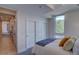 Inviting bedroom with a view of the bedroom entrance, generous closets, and a large window at 5125 W 29Th Ave # 1, Denver, CO 80212