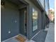 Contemporary townhouse with a welcome mat and well-kept landscaping at 5125 W 29Th Ave # 1, Denver, CO 80212