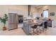 Contemporary kitchen with sleek cabinetry, stainless steel appliances, and island with bar seating at 5125 W 29Th Ave # 1, Denver, CO 80212
