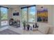 Bright living room with hardwood floors and a large window offering scenic views at 5125 W 29Th Ave # 1, Denver, CO 80212