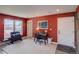 Living room with white carpet, a work desk, and gym equipment provides plenty of space at 5125 W 29Th Ave # 1, Denver, CO 80212