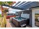 Rooftop deck boasts hot tub, bar area, and pergola, ideal for outdoor entertaining and relaxation at 5125 W 29Th Ave # 1, Denver, CO 80212