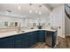 Stylish bar area featuring custom cabinetry and a convenient beverage refrigerator at 937 Aztec Dr, Castle Rock, CO 80108