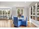 Cozy breakfast nook with hardwood floors, lots of windows, and an adjacent living area at 937 Aztec Dr, Castle Rock, CO 80108
