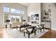 Elegant living room with high ceilings, modern fireplace, and stylish furnishings at 937 Aztec Dr, Castle Rock, CO 80108