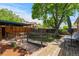 Spacious backyard with mature tree, deck, and lush landscaping at 40 Colorado Blvd, Denver, CO 80206