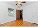 Bedroom featuring hardwood floors and white walls at 40 Colorado Blvd, Denver, CO 80206