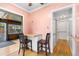 Charming eat-in kitchen with hardwood floors and seating for two at 40 Colorado Blvd, Denver, CO 80206