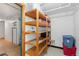 Basement storage with wooden shelving and ample space at 40 Colorado Blvd, Denver, CO 80206
