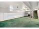 Large basement with a fireplace and ample open space at 6185 Sheridan Blvd, Arvada, CO 80003