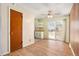 A versatile dining room featuring sliding glass doors to the backyard and an overhead ceiling fan at 6185 Sheridan Blvd, Arvada, CO 80003