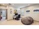 Bright home office featuring modern decor, desk, chair, and comfortable beanbag seating at 6883 E 132Nd Pl, Thornton, CO 80602