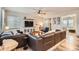 Spacious living room features a large sofa and decorative elements at 6883 E 132Nd Pl, Thornton, CO 80602