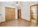 Spacious unfinished basement with wood floors and closet at 12165 Monaco Dr, Brighton, CO 80602