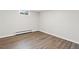 Basement bedroom with vinyl flooring, offering neutral tones and natural light at 741 S 6Th Ave, Brighton, CO 80601