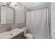Updated bathroom featuring a stylish vanity and a shower with modern fixtures at 741 S 6Th Ave, Brighton, CO 80601