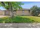 Charming home featuring a well-maintained lawn, mature trees, and a single-car garage at 741 S 6Th Ave, Brighton, CO 80601
