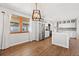 Open kitchen flows from the dining area, featuring modern appliances and stylish finishes at 741 S 6Th Ave, Brighton, CO 80601