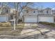 Home's exterior with well-kept lawn, and a 'For Sale' sign in the front yard, providing an appealing curb presence at 22150 E Berry Pl, Aurora, CO 80015