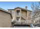 Townhome with a private entrance, staircase, balcony, and a dedicated parking spot at 8334 Pebble Creek Way # 201, Highlands Ranch, CO 80126