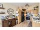 Eat-in kitchen featuring stainless steel appliances, ample cabinet space, and a decorative backsplash at 8334 Pebble Creek Way # 201, Highlands Ranch, CO 80126