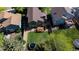 Aerial view of backyard, deck, landscaping and nearby homes at 728 Poppywood Pl, Highlands Ranch, CO 80126