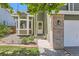 Inviting front entrance featuring a bay window and well-kept landscaping at 728 Poppywood Pl, Highlands Ranch, CO 80126