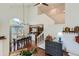 Open-concept living area with a staircase, hardwood floors, and a dining area at 728 Poppywood Pl, Highlands Ranch, CO 80126
