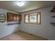This bedroom features built-in cabinets, shelves and a bay window offering natural light at 790 Mohawk Dr, Boulder, CO 80303