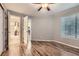 This bedroom has newer floors, ceiling fan and has direct access to the adjacent bathroom and kitchen at 836 S Vance St # D, Lakewood, CO 80226