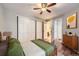 Tranquil bedroom with closet, natural light, and easy access to the ensuite bathroom at 836 S Vance St # D, Lakewood, CO 80226