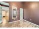 This bedroom has high ceilings, new floors, and easy access to the rest of the house at 836 S Vance St # D, Lakewood, CO 80226