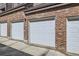 Row of private garages, providing secure parking and additional storage for residents' convenience and peace of mind at 836 S Vance St # D, Lakewood, CO 80226