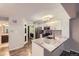 Modern kitchen featuring stainless appliances, sleek countertops, and ample cabinet space at 836 S Vance St # D, Lakewood, CO 80226